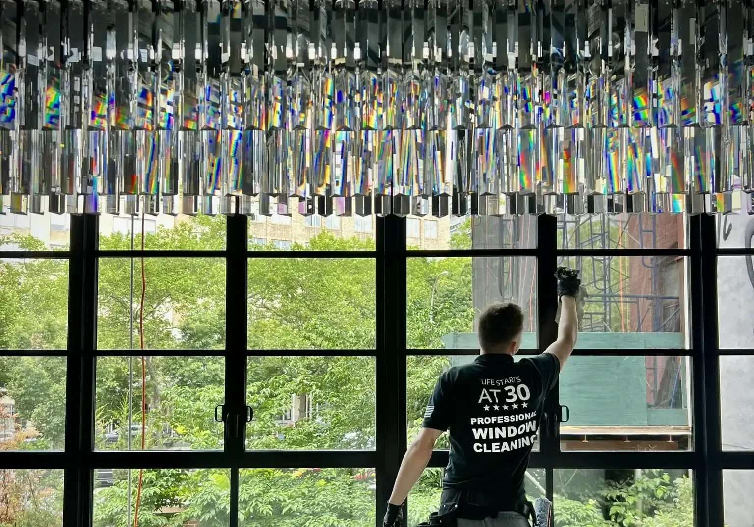 cleaning window with many muntins